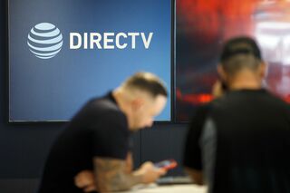 ディレクＴＶとディッシュ、合併に向け初期段階の交渉中－関係者